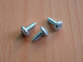 Lens head screw