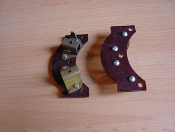 Brush holder plate
