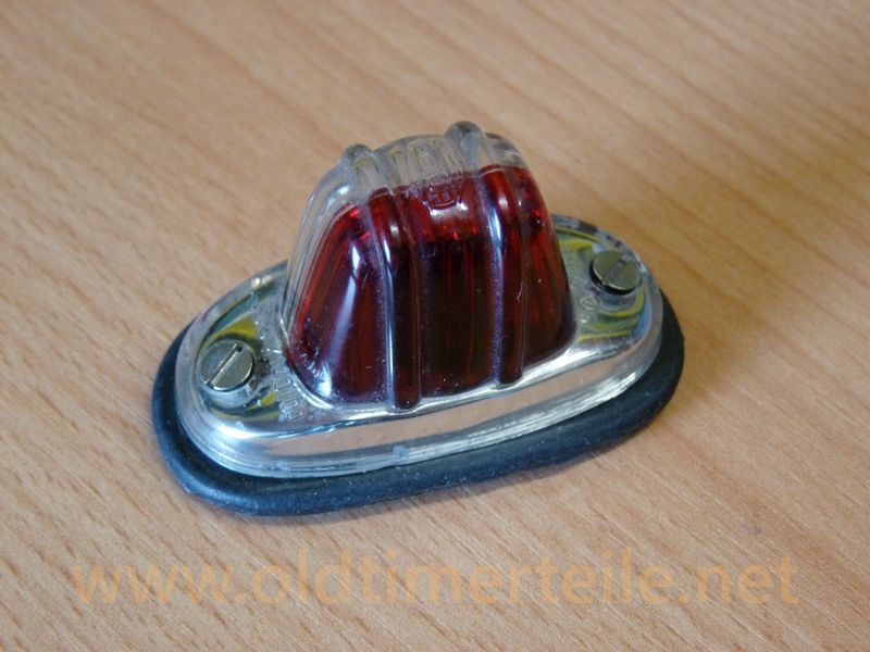 Parking lamp, white front, red rear, edging chrome Hella-Nr.:2151
height: about 35mm 
length: including rubber base about 58mm 
incl. installation guide
