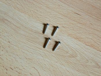 Raised countersunk head self-tapping screw