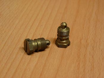 Idle speed pipe clamp screw