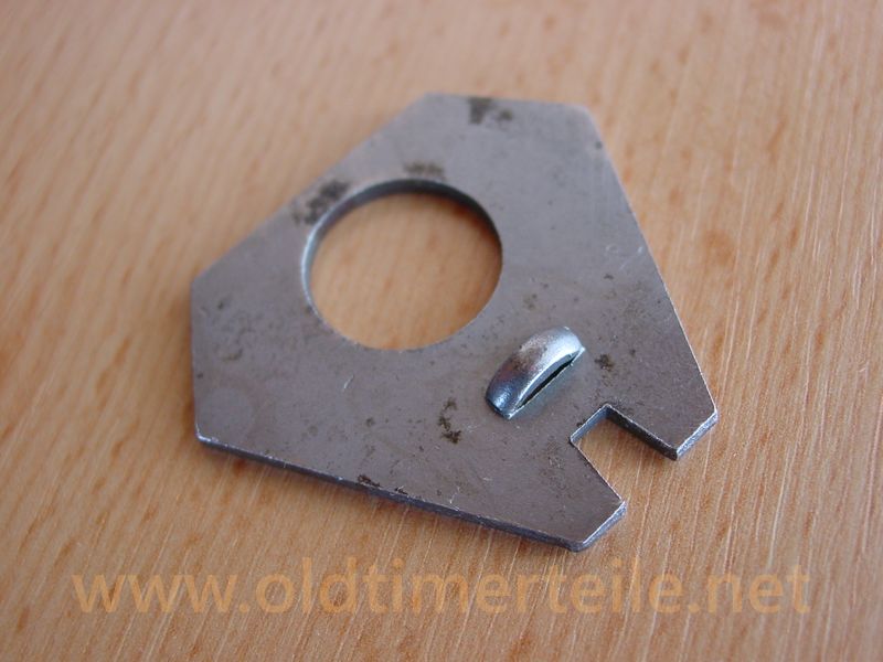 Spring fastener plate
